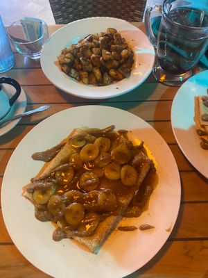 Banana foster crepe and house potatoes(full order) at Zest Garden Cafe in Lincoln City