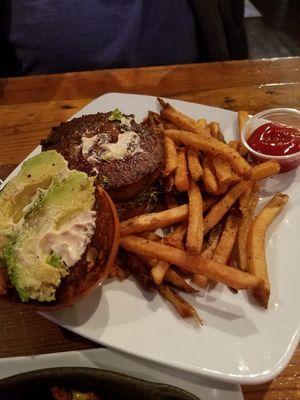 Beyond Burger with avocado, vegan aoili and house fries. at Cafe Nola in Frederick