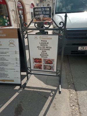 Sign on the street (you go through a passage on the left to get to the restaurant) at Domenico in Varazdin