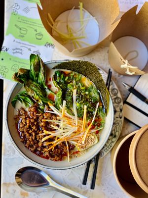 Tantanman Ramen - creamy, vegetables broth, spicy vegan meat, white sesame, grilled pak choy, leek, chilli and sichuan oil. at The Cool Cat in Warsaw