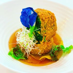 Spinach leaves in a fried coating with apple sauce at NA NA  in Playa Del Carmen