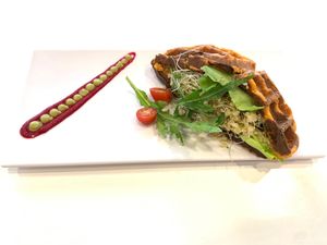 Salty waffle stuffed with vegetables and quinoa with chilli mango sauce at NA NA  in Playa Del Carmen