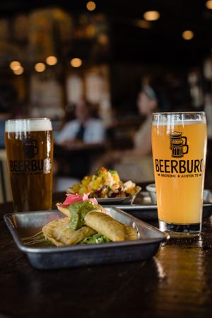 vegan black bean and sikil pak empanadas, Hazy IPA, and Pale Ale at Beerburg Brewing in Austin