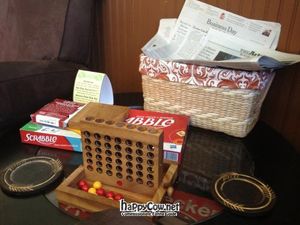 Games & papers for customers to use at FeelGoods Cafe in St James