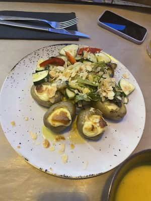 Cheese and potatoes dish  at Sete Restaurante in Coimbra