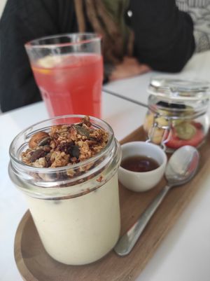 Vegan yogurt with granola and fruits at Maria Limão in Porto