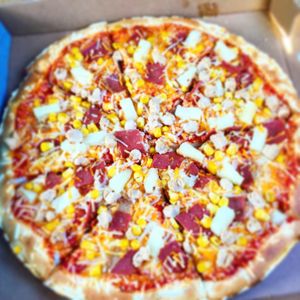 Create your own: tandoori chicken, bacon, sweetcorn and pineapple  at Vizza Guys in Gateshead