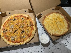 Chicken sweetcorn and mushroom pizza and garlic bread  at Vizza Guys in Gateshead