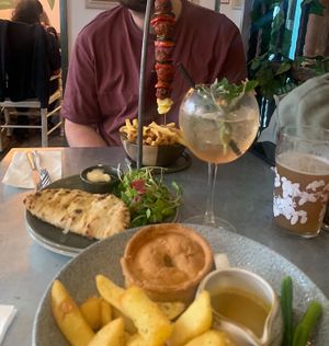 Vegan pie and curry and a vegan meatball skewer with flatbread and salad  at The Botanist in York