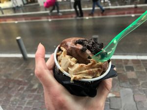 Vegan chocolate orange and fig ice cream scoops with Oreos on top at Caravel in Athens