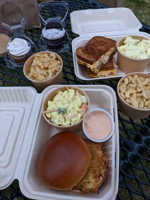Our picnic spread. Reuben and crabby sandwich pictured. at Earth Based Cafe in Martinsburg