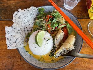 Curry dish with tofu and vegetables. Plus spring roll optional extra    at Nam Song in Sheffield