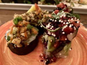 Fruity.  Veggie roll topped with raspberry  at The Slippery Mermaid Sushi Bar in Navarre