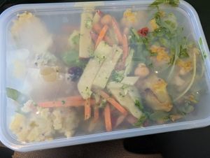Mixed salads in plastic takeaway container at Crooked Kitchen in Bendigo