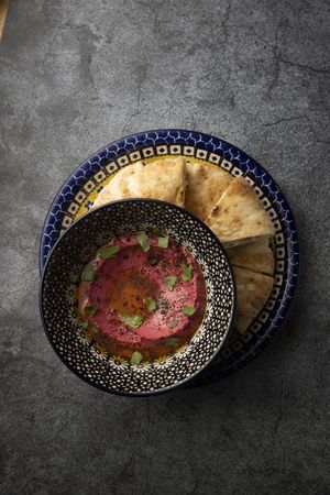 Beetroot hummus, olive oil, sumac & pita bread.  at Salam in Tokyo