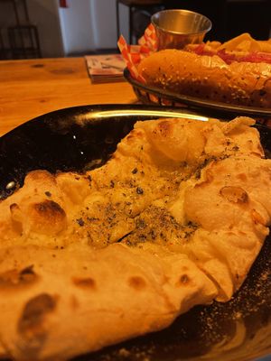 Garlic and cheese bread  at Plant Base in Lisbon