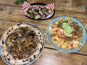 Tacos, nachos and mixed mushroom pizza  at Plant Base in Lisbon