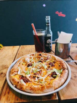 Bigger than Mac PIZZA and Long Island Iced Tea at Plant Base in Lisbon