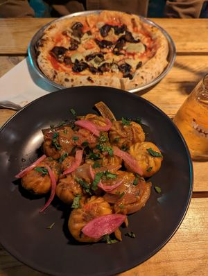 Plant base pizza and dumplings at Plant Base in Lisbon