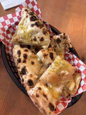 garlic bread with vegan cheese  at Plant Base in Lisbon