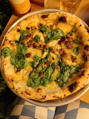 Potato and meat pizza at Plant Base in Lisbon