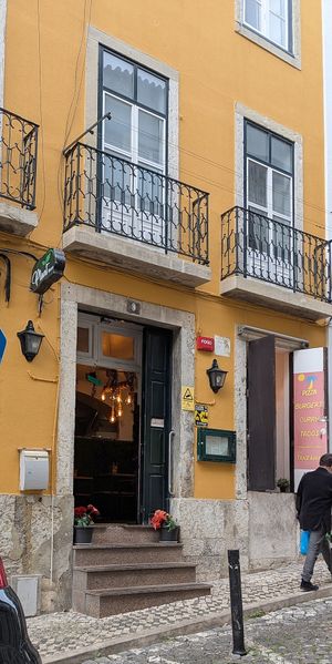 Small sign outside, and up a few steps at Plant Base in Lisbon