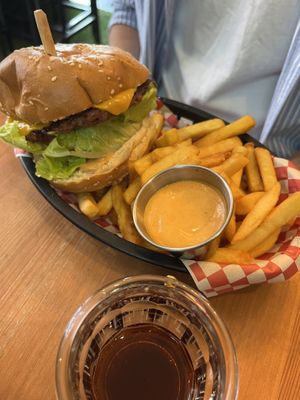 Burger served with fries   at Plant Base in Lisbon