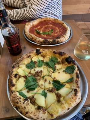 Vegan sausage and potato pizza with cheese base and a marinara  at Plant Base in Lisbon