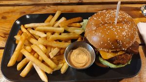 Vegan BBQ "bacon" burger, French fries. at Plant Base in Lisbon