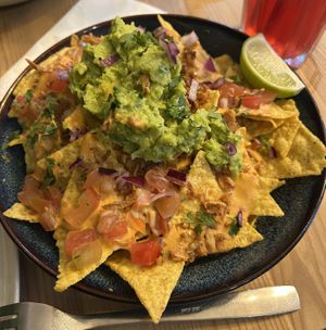 Nachos (was a bit too liquid at the bottom, the chips got super wet)  at Plant Base in Lisbon