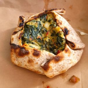 Espinaca empanada (spinach, onion and tofu) at Plant Base in Lisbon
