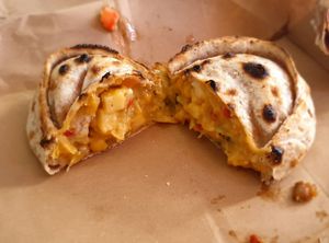 Humita empanada (corn, onion, vegan cheese, basil) at Plant Base in Lisbon