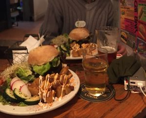 Black bean and spicy burger, cider, DIPA   at Cat Bar in Barcelona