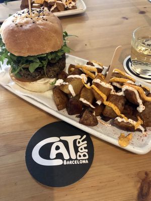 Champion, Bravas and a Glass of Wine!  at Cat Bar in Barcelona