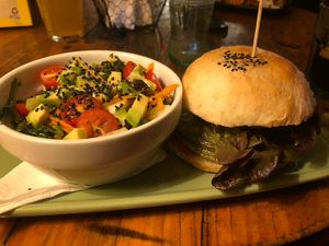 Cactus Burger and side salad  at Cat Bar in Barcelona