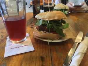 Champion burger and a sour beer at Cat Bar in Barcelona