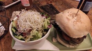 Cactus burger with salad at Cat Bar in Barcelona
