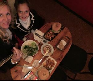 Ensalada, humus, 2 hamburgers y patata total 27€ at Cat Bar in Barcelona