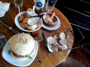 Burger, papas bravas, hummus at Cat Bar in Barcelona