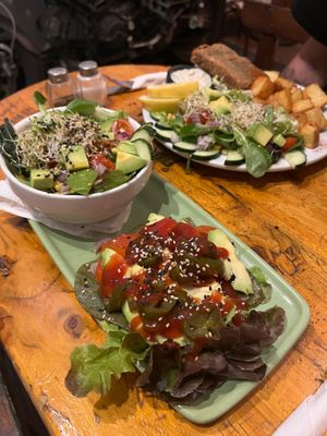 Grilled cactus with salad in the front, tofish with chips and salad in the back. A lot of fresh and tasty stuff! at Cat Bar in Barcelona