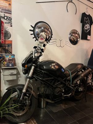 Motorcycle as a design element. A lot of punk elements around! at Cat Bar in Barcelona