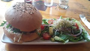 Mushroom burger with side salad at Cat Bar in Barcelona