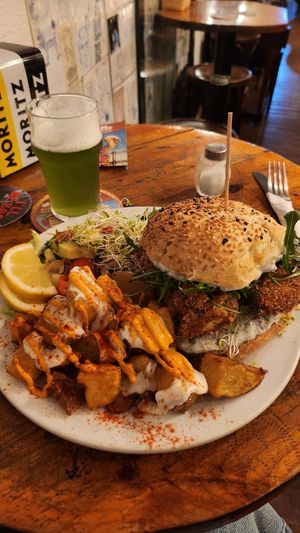 The Tofish sandvitx with pastas bravas and salad is amazing! Big portion super affordable and delicious. Finally eating something different from the regular veggie burger! 💜 at Cat Bar in Barcelona