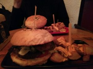 Black Cat burger with potato wedges and vegannaise. at Cat Bar in Barcelona