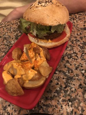 Burger with chips at Cat Bar in Barcelona