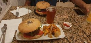 Mushroom burger with "papas bravas" at Cat Bar in Barcelona