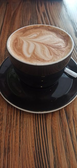 18 PLN latte with soy milk at Gossip Cafe in Krakow
