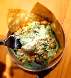 Hummus based dressing with capers. at Bad Boyz Kitchen in Bratislava