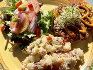 Veggie burger with potato salad  at Lotus Cafe in Panama City Beach