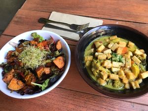 Harvest bowl and vegetable curry with tempeh .  at Lotus Cafe in Panama City Beach